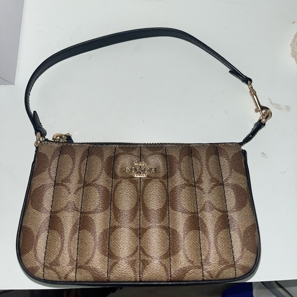 Coach Nolita 19